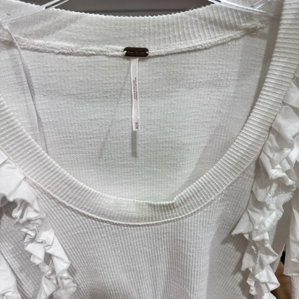 Free people what a ruffle top Size M